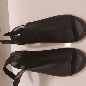 Remonte women's leather black low sandal ankle strap shoes.